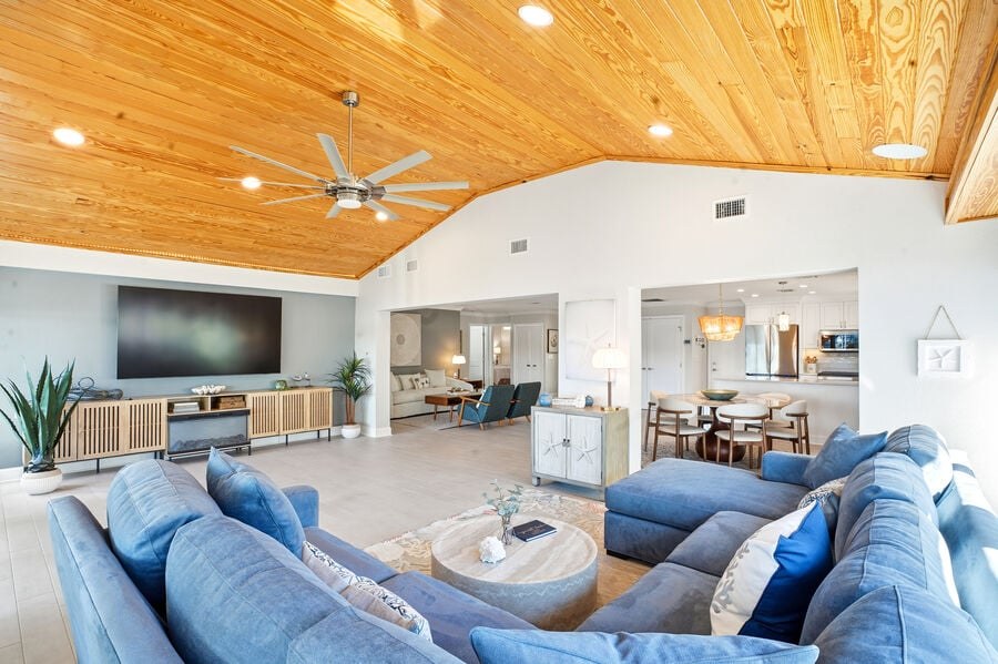 Living room under warm wood ceilings